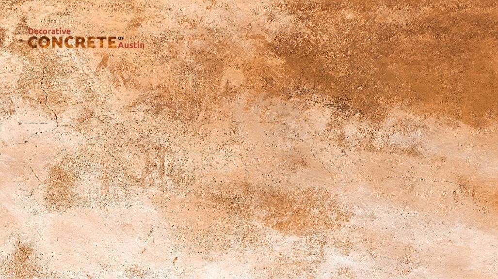 Textured brown and beige concrete surface with visible cracks and rough patches, creating an earthy aesthetic.