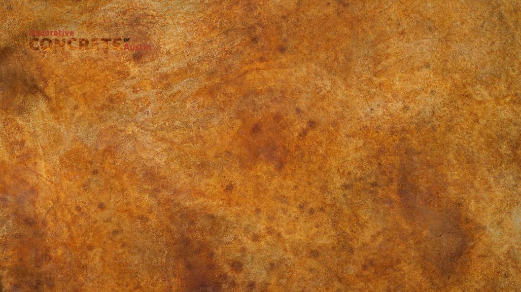 A textured surface with a rusty, orange-brown pattern, resembling aged metal or stone. The tones convey a warm, earthy, and rustic fee