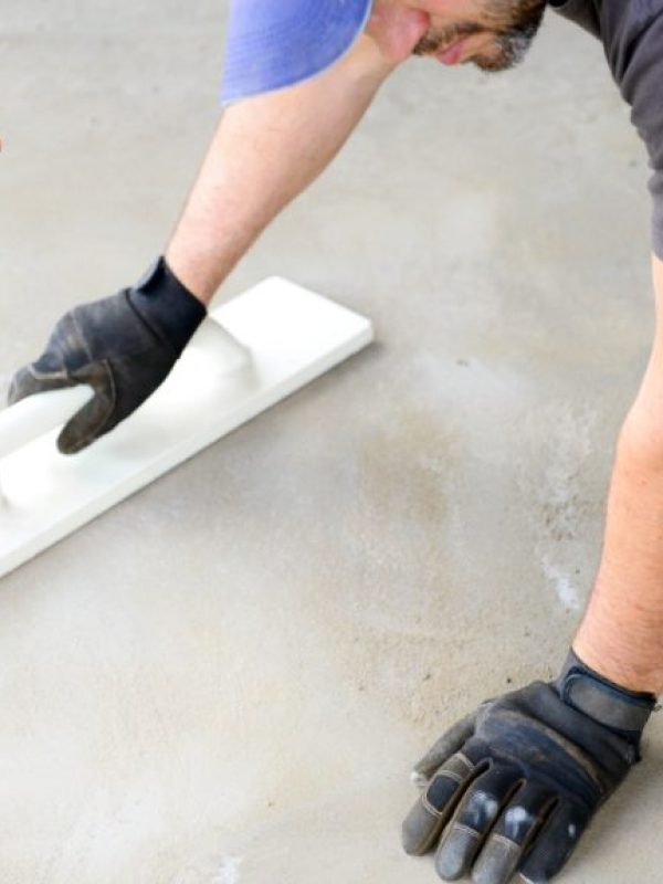 person polishing concrete floor