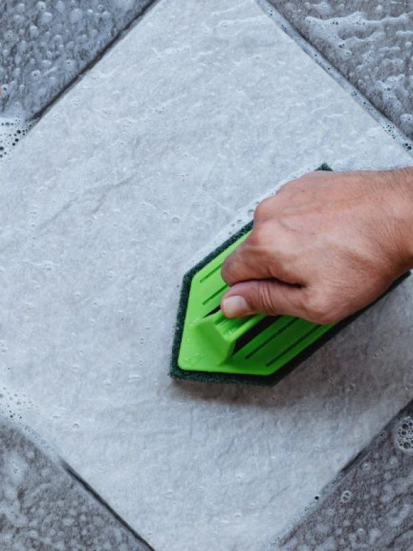 person brushing surface